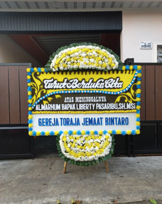 Papan Bunga Duka di Bendung